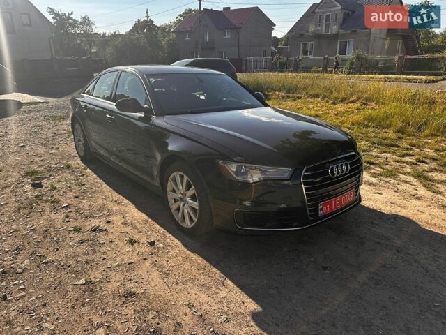Черный Ауди А6, объемом двигателя 2 л и пробегом 170 тыс. км за 16200 $, фото 1 на Automoto.ua