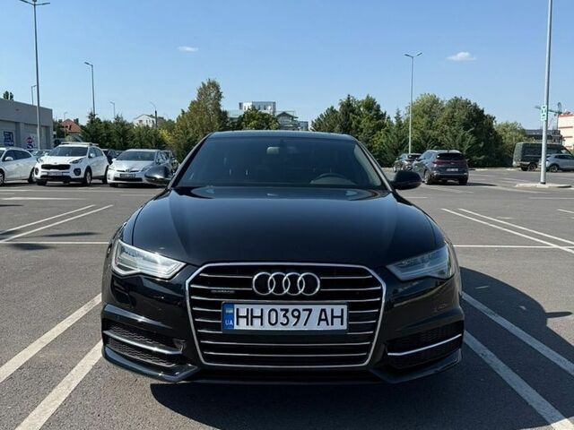 Черный Ауди А6, объемом двигателя 1.98 л и пробегом 165 тыс. км за 23900 $, фото 1 на Automoto.ua