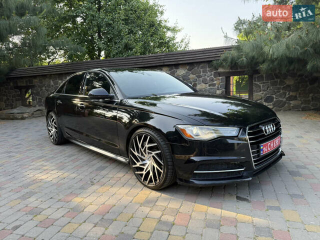Чорний Ауді А6, об'ємом двигуна 2 л та пробігом 159 тис. км за 13999 $, фото 1 на Automoto.ua