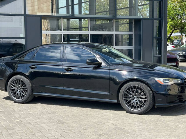 Черный Ауди А6, объемом двигателя 2 л и пробегом 255 тыс. км за 16800 $, фото 1 на Automoto.ua