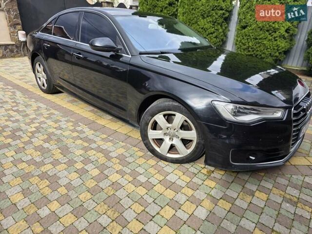 Ауді А6 2015 у Ужгороді на Automoto.ua Чорний Ауді А6, об'ємом двигуна 1.97 л та пробігом 190 тис. км за 21500 $, фото 1 на Automoto.ua