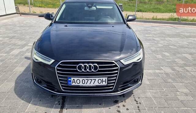 Черный Ауди А6, объемом двигателя 2 л и пробегом 260 тыс. км за 20500 $, фото 1 на Automoto.ua