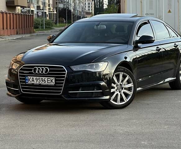 Черный Ауди А6, объемом двигателя 2 л и пробегом 123 тыс. км за 20000 $, фото 1 на Automoto.ua