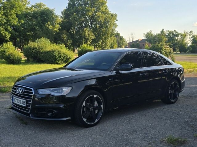 Чорний Ауді А6, об'ємом двигуна 2 л та пробігом 135 тис. км за 18450 $, фото 1 на Automoto.ua