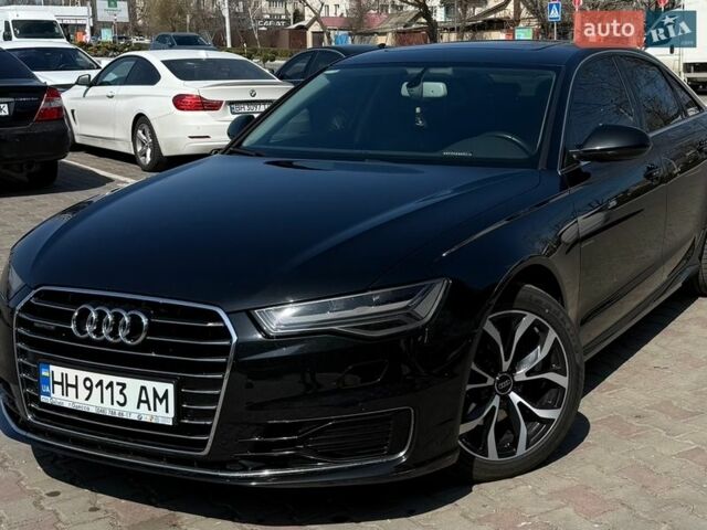 Черный Ауди А6, объемом двигателя 1.97 л и пробегом 210 тыс. км за 21000 $, фото 1 на Automoto.ua