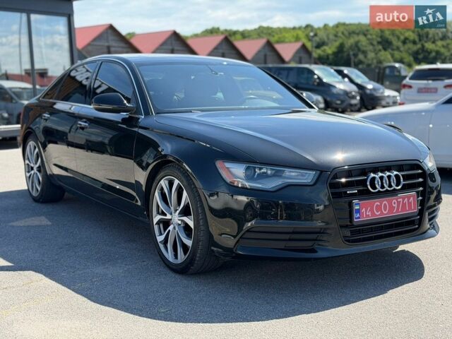 Черный Ауди А6, объемом двигателя 2 л и пробегом 214 тыс. км за 15399 $, фото 1 на Automoto.ua