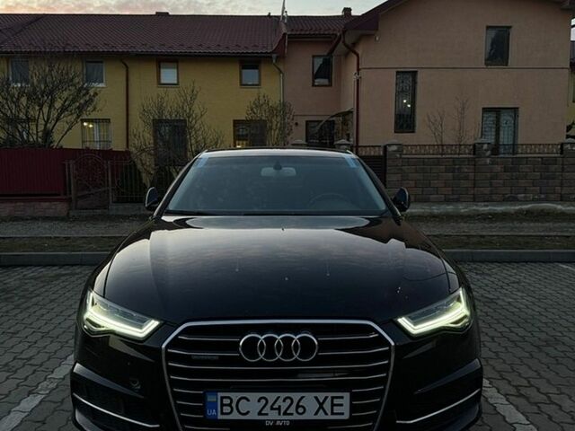 Черный Ауди А6, объемом двигателя 1.98 л и пробегом 209 тыс. км за 10900 $, фото 1 на Automoto.ua