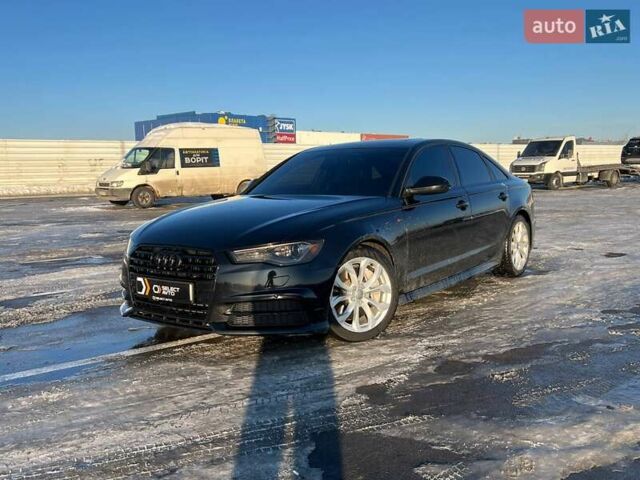 Черный Ауди А6, объемом двигателя 2 л и пробегом 154 тыс. км за 15990 $, фото 1 на Automoto.ua