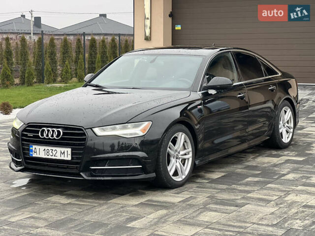 Чорний Ауді А6, об'ємом двигуна 1.98 л та пробігом 240 тис. км за 12900 $, фото 1 на Automoto.ua