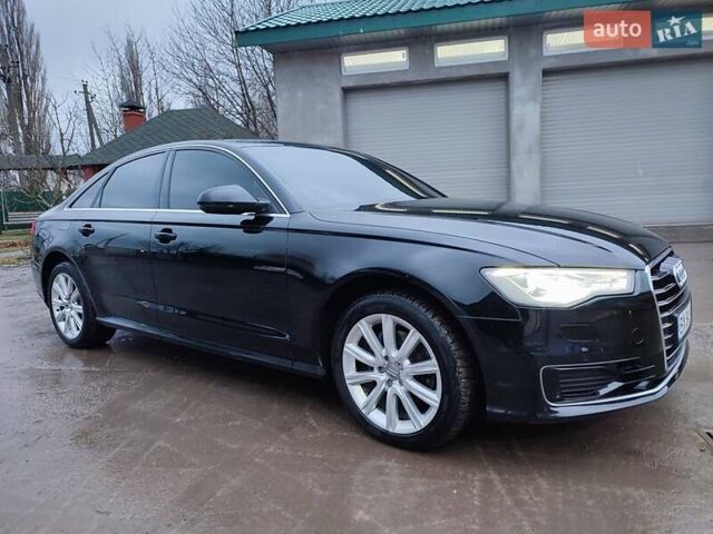 Черный Ауди А6, объемом двигателя 1.97 л и пробегом 241 тыс. км за 17600 $, фото 1 на Automoto.ua
