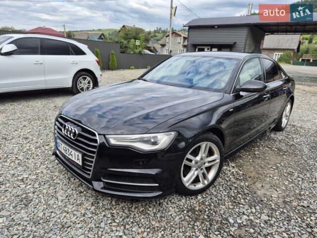Черный Ауди А6, объемом двигателя 1.97 л и пробегом 304 тыс. км за 17500 $, фото 1 на Automoto.ua