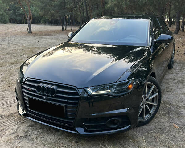 Черный Ауди А6, объемом двигателя 3 л и пробегом 67 тыс. км за 24499 $, фото 1 на Automoto.ua