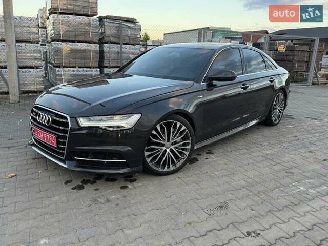 Черный Ауди А6, объемом двигателя 1.98 л и пробегом 161 тыс. км за 15900 $, фото 1 на Automoto.ua