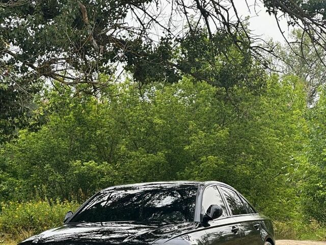 Черный Ауди А6, объемом двигателя 3 л и пробегом 124 тыс. км за 22500 $, фото 1 на Automoto.ua