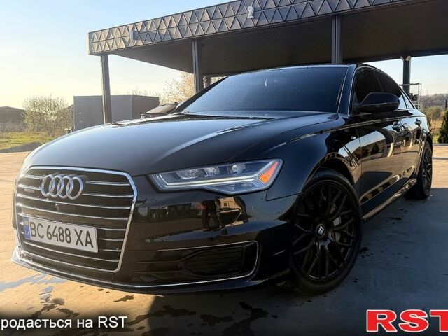 Черный Ауди А6, объемом двигателя 2 л и пробегом 94 тыс. км за 25400 $, фото 1 на Automoto.ua