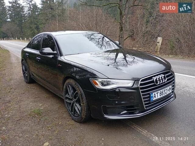Черный Ауди А6, объемом двигателя 2 л и пробегом 317 тыс. км за 18900 $, фото 1 на Automoto.ua