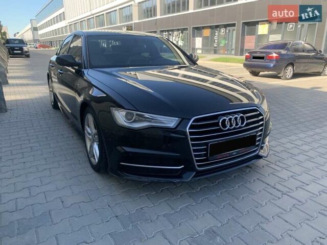 Черный Ауди А6, объемом двигателя 2 л и пробегом 303 тыс. км за 21900 $, фото 1 на Automoto.ua