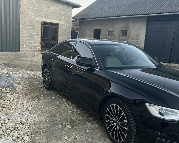 Черный Ауди А6, объемом двигателя 2 л и пробегом 118 тыс. км за 20500 $, фото 1 на Automoto.ua