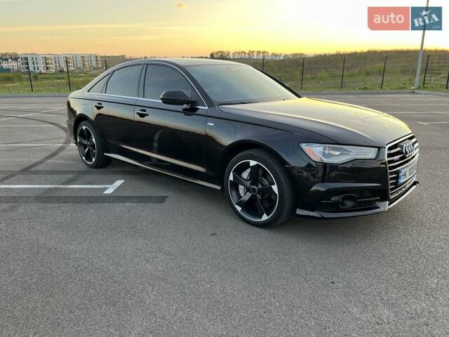 Черный Ауди А6, объемом двигателя 1.98 л и пробегом 130 тыс. км за 18800 $, фото 1 на Automoto.ua