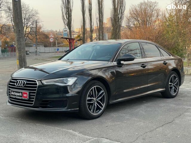 Черный Ауди А6, объемом двигателя 2 л и пробегом 300 тыс. км за 17990 $, фото 1 на Automoto.ua