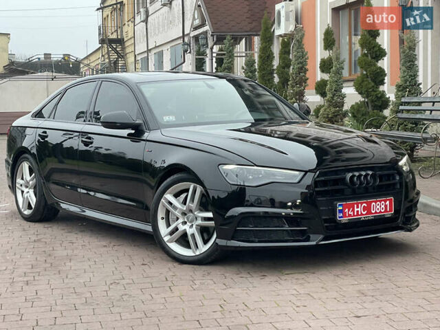 Черный Ауди А6, объемом двигателя 2 л и пробегом 193 тыс. км за 17850 $, фото 1 на Automoto.ua