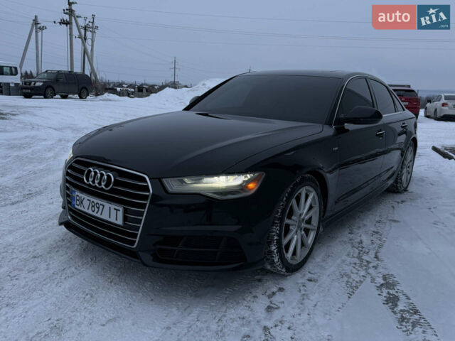 Черный Ауди А6, объемом двигателя 1.98 л и пробегом 230 тыс. км за 16200 $, фото 1 на Automoto.ua