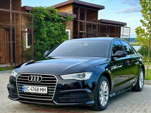 Черный Ауди А6, объемом двигателя 2 л и пробегом 194 тыс. км за 21500 $, фото 1 на Automoto.ua