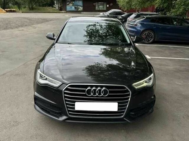 Чорний Ауді А6, об'ємом двигуна 2 л та пробігом 169 тис. км за 15700 $, фото 1 на Automoto.ua