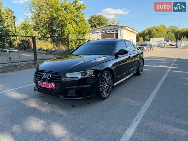Черный Ауди А6, объемом двигателя 2 л и пробегом 300 тыс. км за 10600 $, фото 1 на Automoto.ua