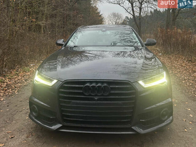 Черный Ауди А6, объемом двигателя 3 л и пробегом 199 тыс. км за 19800 $, фото 1 на Automoto.ua