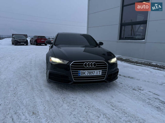 Черный Ауди А6, объемом двигателя 1.98 л и пробегом 222 тыс. км за 18600 $, фото 1 на Automoto.ua