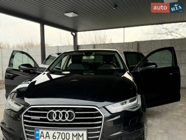 Черный Ауди А6, объемом двигателя 1.97 л и пробегом 160 тыс. км за 28000 $, фото 1 на Automoto.ua