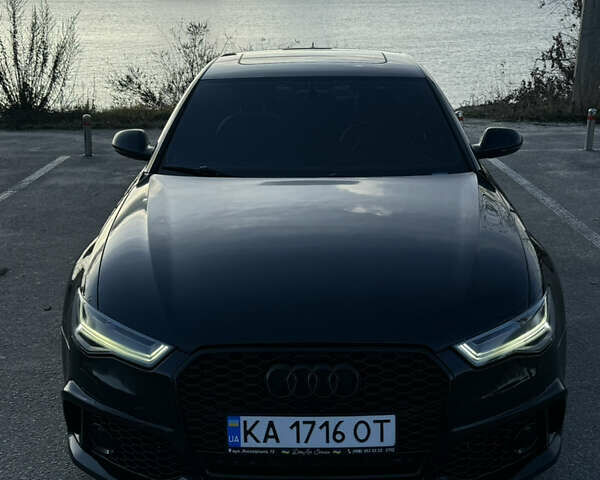 Чорний Ауді А6, об'ємом двигуна 1.98 л та пробігом 140 тис. км за 18500 $, фото 1 на Automoto.ua