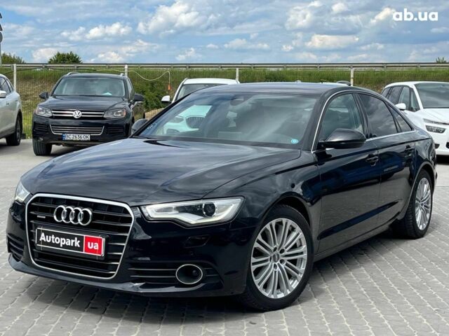 Чорний Ауді А6, об'ємом двигуна 2 л та пробігом 241 тис. км за 20290 $, фото 1 на Automoto.ua
