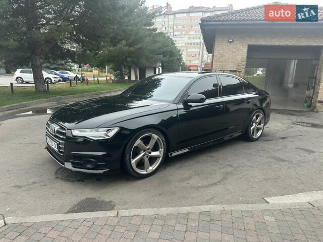 Чорний Ауді А6, об'ємом двигуна 1.97 л та пробігом 77 тис. км за 22500 $, фото 1 на Automoto.ua