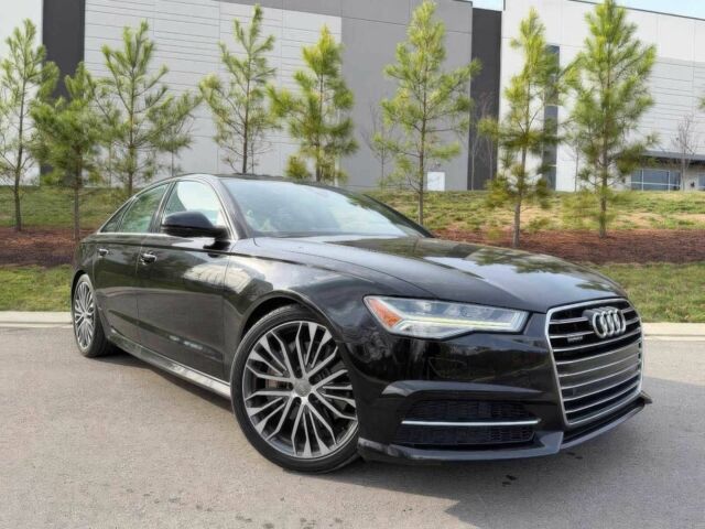 Черный Ауди А6, объемом двигателя 3 л и пробегом 80 тыс. км за 14100 $, фото 1 на Automoto.ua