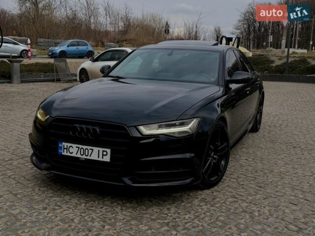 Чорний Ауді А6, об'ємом двигуна 1.98 л та пробігом 143 тис. км за 18500 $, фото 1 на Automoto.ua