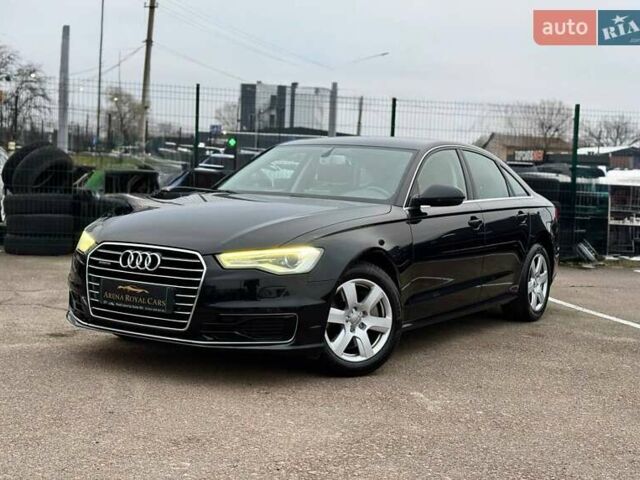 Черный Ауди А6, объемом двигателя 1.98 л и пробегом 252 тыс. км за 14990 $, фото 1 на Automoto.ua
