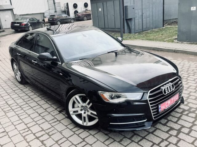 Черный Ауди А6, объемом двигателя 2 л и пробегом 270 тыс. км за 10800 $, фото 1 на Automoto.ua