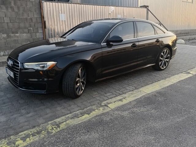 Чорний Ауді А6, об'ємом двигуна 2 л та пробігом 136 тис. км за 16883 $, фото 1 на Automoto.ua