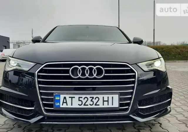 Черный Ауди А6, объемом двигателя 2 л и пробегом 125 тыс. км за 16500 $, фото 1 на Automoto.ua