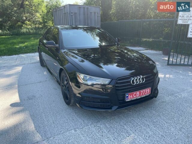 Черный Ауди А6, объемом двигателя 2 л и пробегом 299 тыс. км за 12650 $, фото 1 на Automoto.ua
