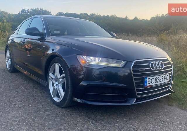 Чорний Ауді А6, об'ємом двигуна 1.98 л та пробігом 127 тис. км за 26300 $, фото 1 на Automoto.ua