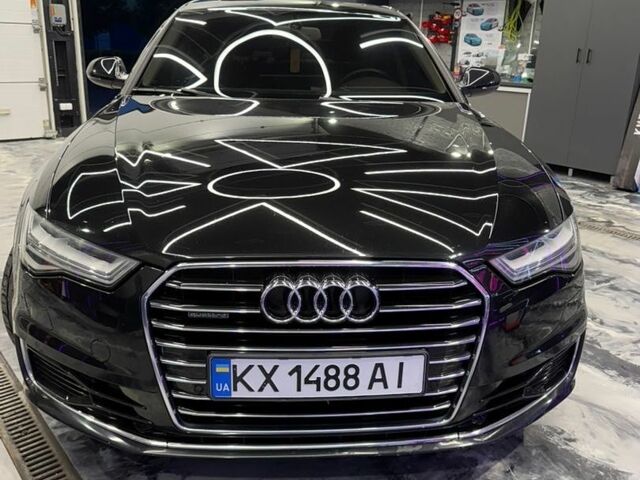 Черный Ауди А6, объемом двигателя 2 л и пробегом 210 тыс. км за 16300 $, фото 1 на Automoto.ua