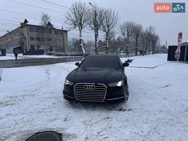 Черный Ауди А6, объемом двигателя 2 л и пробегом 122 тыс. км за 14299 $, фото 1 на Automoto.ua