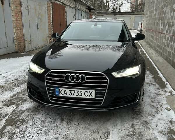 Черный Ауди А6, объемом двигателя 1.97 л и пробегом 133 тыс. км за 27300 $, фото 1 на Automoto.ua