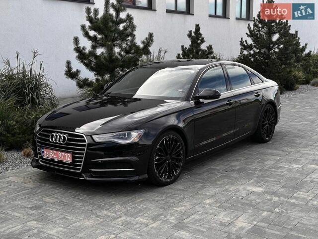 Черный Ауди А6, объемом двигателя 2 л и пробегом 191 тыс. км за 12999 $, фото 1 на Automoto.ua