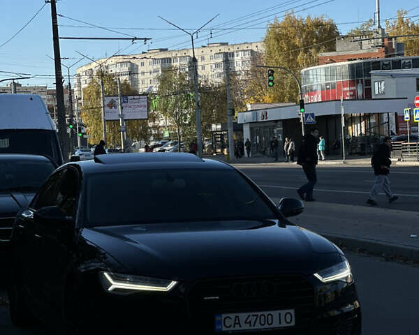 Черный Ауди А6, объемом двигателя 2 л и пробегом 124 тыс. км за 23500 $, фото 1 на Automoto.ua