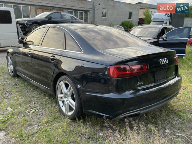 Черный Ауди А6, объемом двигателя 2 л и пробегом 218 тыс. км за 11800 $, фото 1 на Automoto.ua