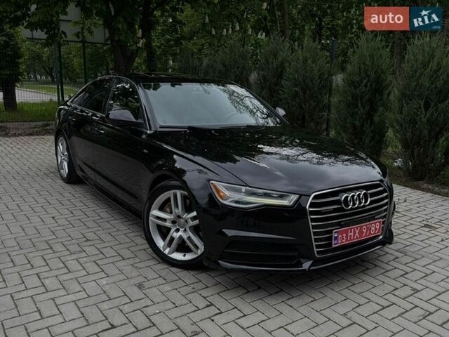Черный Ауди А6, объемом двигателя 1.98 л и пробегом 144 тыс. км за 17300 $, фото 1 на Automoto.ua